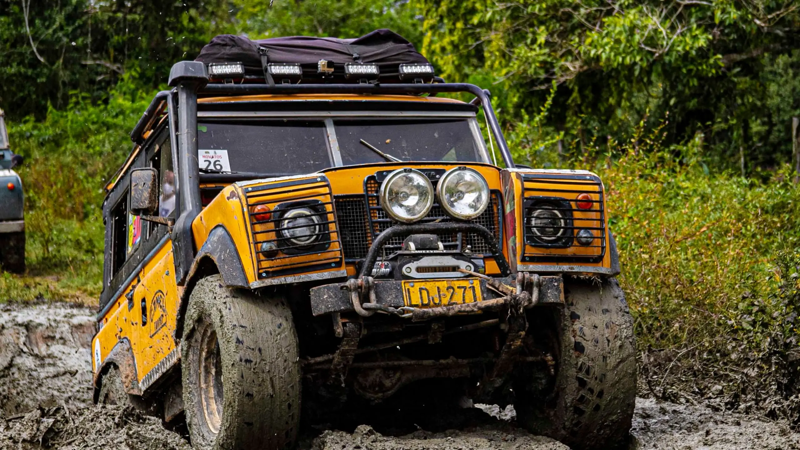 Land Rover tackling an off-road trail