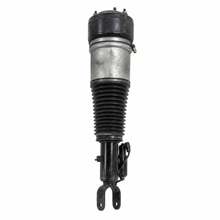 Land Rover front air suspension strut for Discovery on a workshop bench